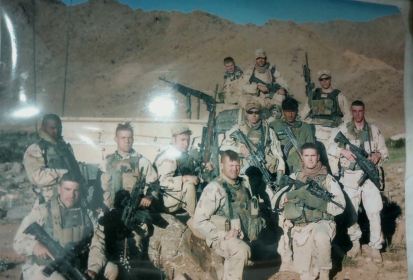 Archival deployment team photo from Carlos Matos military service